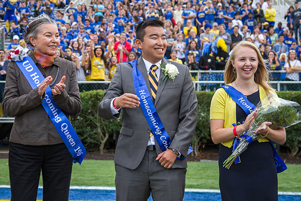 Joyce McLaughlin Newman, the 1963 Homecoming queen, with 2013 king and queen Kye Cho and Cynthia Costello.
