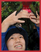 image of student with hummingbird