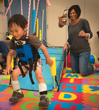 child jumping in harness