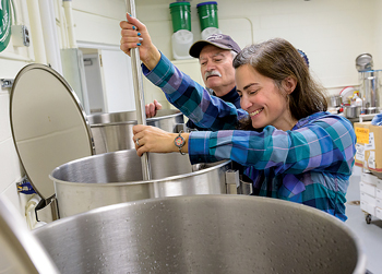 Nicole Donofrio and Dallas Hoover brew up a batch of beer