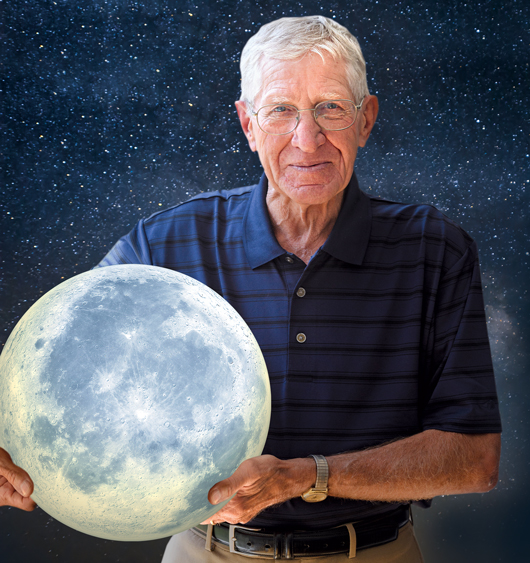 Photo illustration of Sonny Reihm holding the moon in his hands