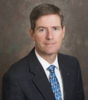 Dr. Charles Riordan