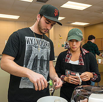 Students in the class try out new seasonings