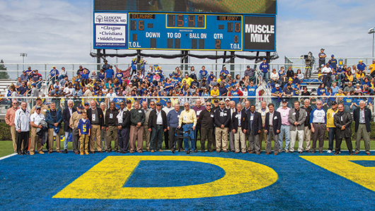 The 1963 team at homecoming 2013