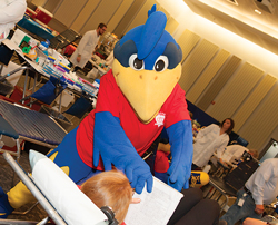 student with YoUDee at blood drive
