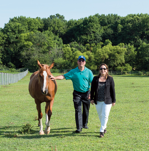 Stuart and Suzanne Grant with a horse