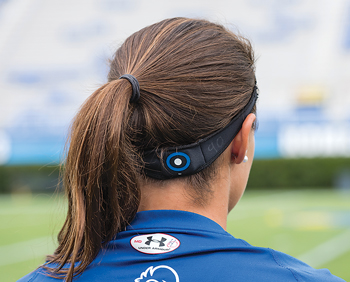 female soccer player wearing SIM-G technology headband