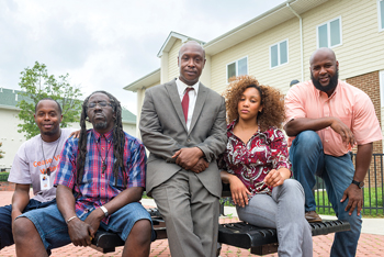 PAR members (from left to right) Derrick Chambers, Patrice Gibbs, Prof. Payne, Ashley Randolph and Darryl Chambers, AS14M, at a housing project
in Wilmington.