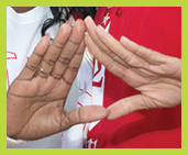 Hands making triangle symbol of Mu Pi sorority