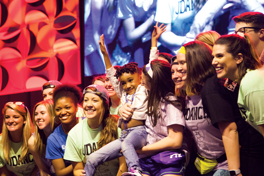 UD students with child at UDance marathon