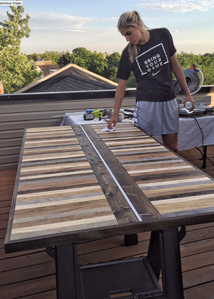 Elena Delle Donne with a table that she made