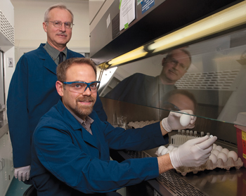 Jack Gelb and Brian Ladman in a poultry lab