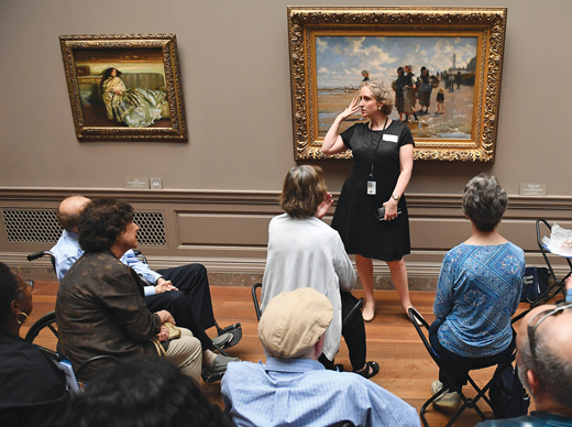 Lorena Bradford, AS11PhD, leads a discussion at the National Gallery.