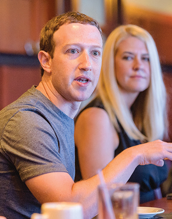 Mark Zuckerberg with UD's Tricia Wachtenbdorf