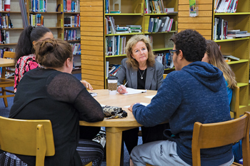 image of Dean Kathy Matt working with students in the Pipeline program