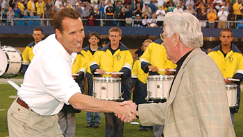 Photo of Tubby Raymond shaking hands with K.C. Keeler